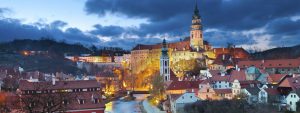 Castle in the center of Cesky Krumlov. Photographed during sunset, castle is lit